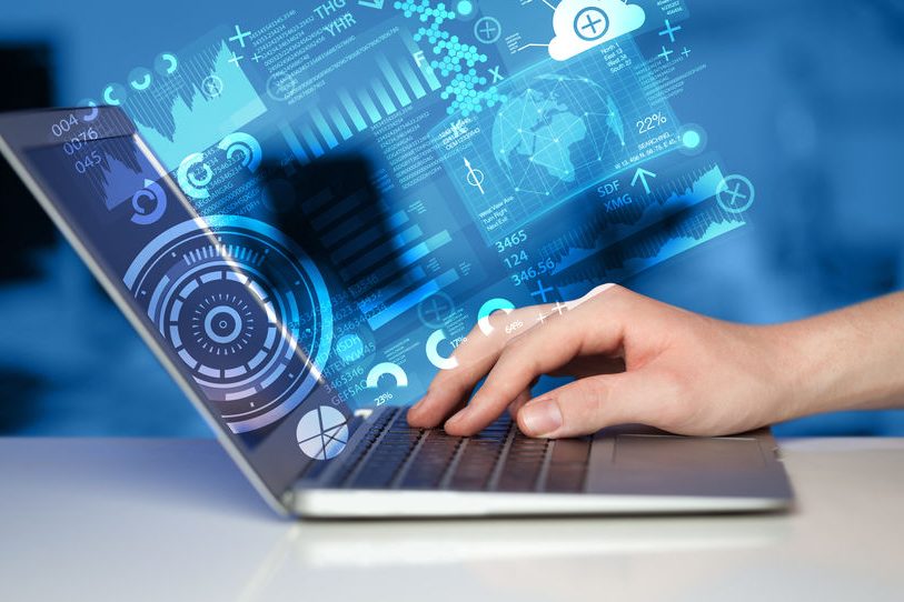 Modern notebook computer with future technology symbols