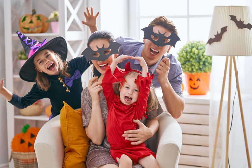 family celebrating Halloween