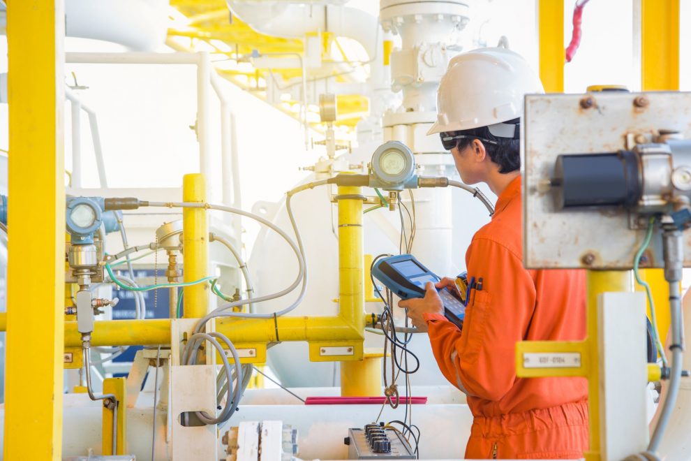 Electrical,And,Instrument,Operator,Calibrating,Temperature,And,Pressure,Transmitter,At